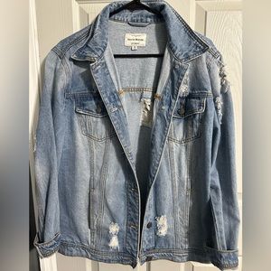 ripped jean jacket size medium.